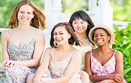 three girls posing for a picture together. emphasizes the sleek design and ergonomic aspects uniquely.